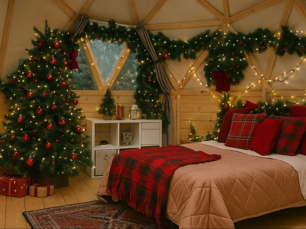 Séance photo de Noël en famille dans un décor chaleureux, ambiance chalet avec guirlandes et sapin.